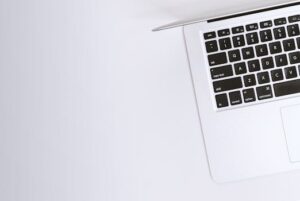 pexels-photo-238118-238118 Aerial view of a sleek laptop keyboard on a clean, white surface, ideal for tech backgrounds.